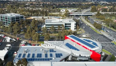 Shot of commercial area with solar panels on roof