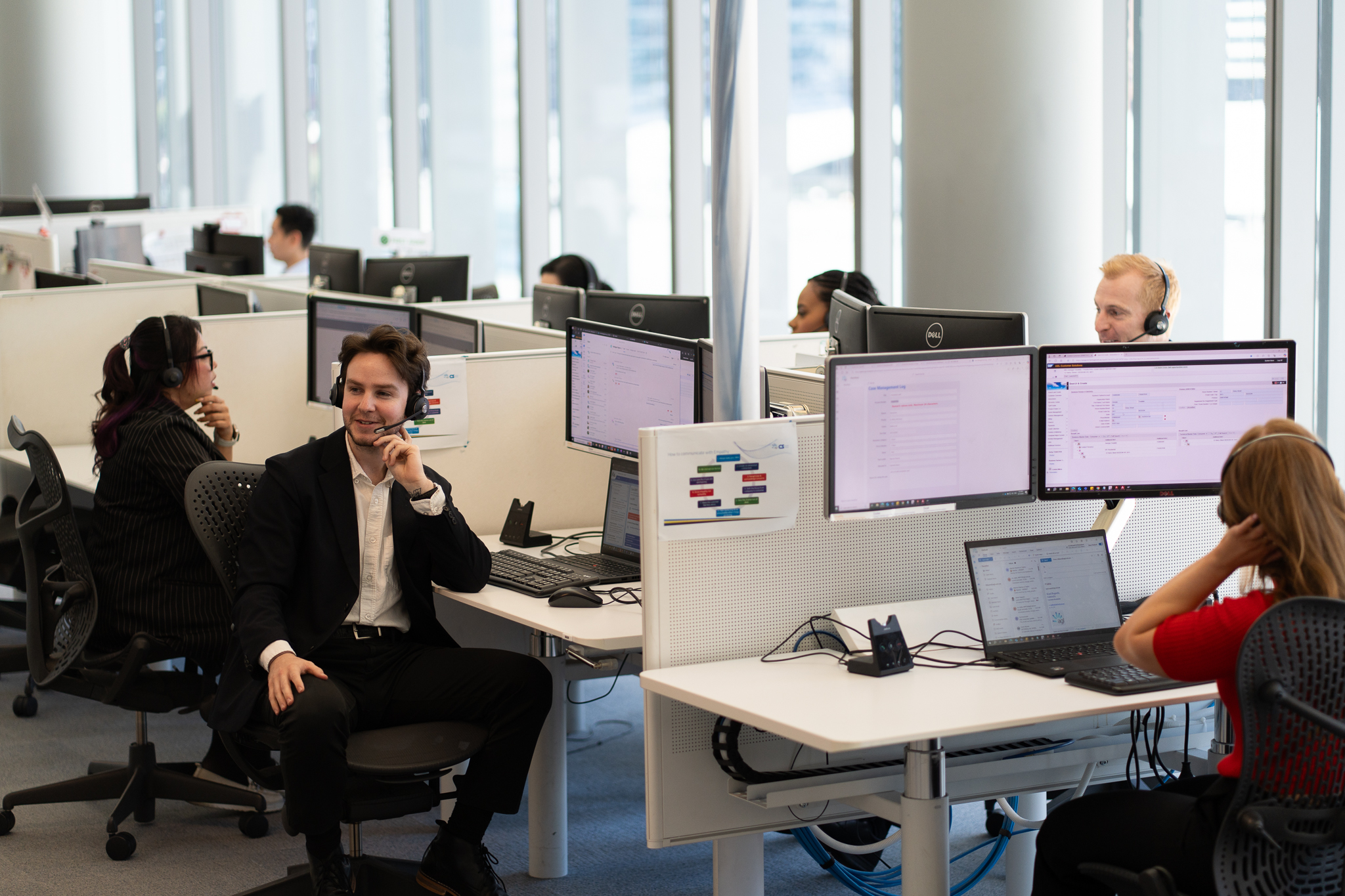 An on-the-job coaching session at one of our contact centres