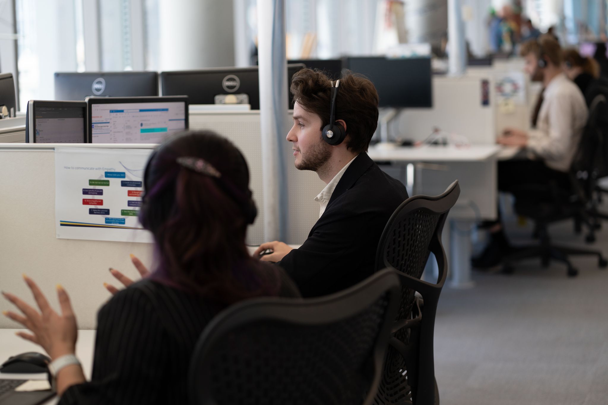 AGL staff at their desks in the offic