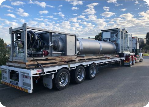 Large road train carrying industrial equipment